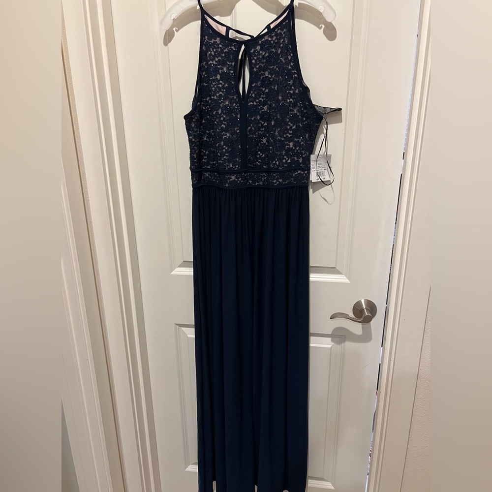 Bridesmaid dress in Navy, size 16 new with tags.
